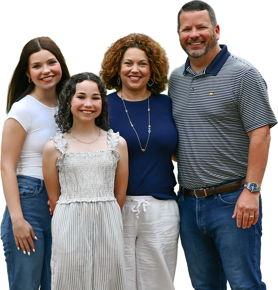 CJ Thompson and family in a field 